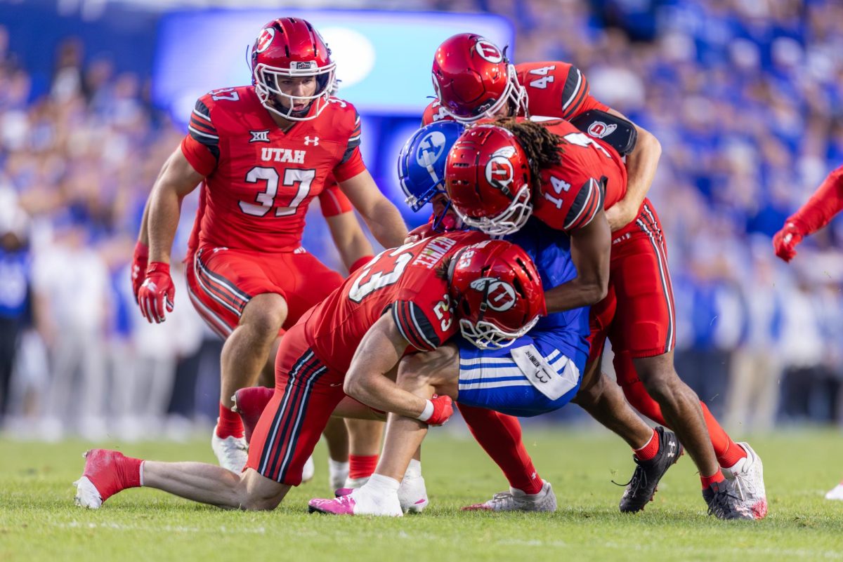 Utah safety Jackson Bennee (23) makes a tackle during the Utes' game against BYU at LaVell Edwards Stadium in Provo, UT on Oct. 18, 2025. (Photo by Mary Allen | The Daily Utah Chronicle)