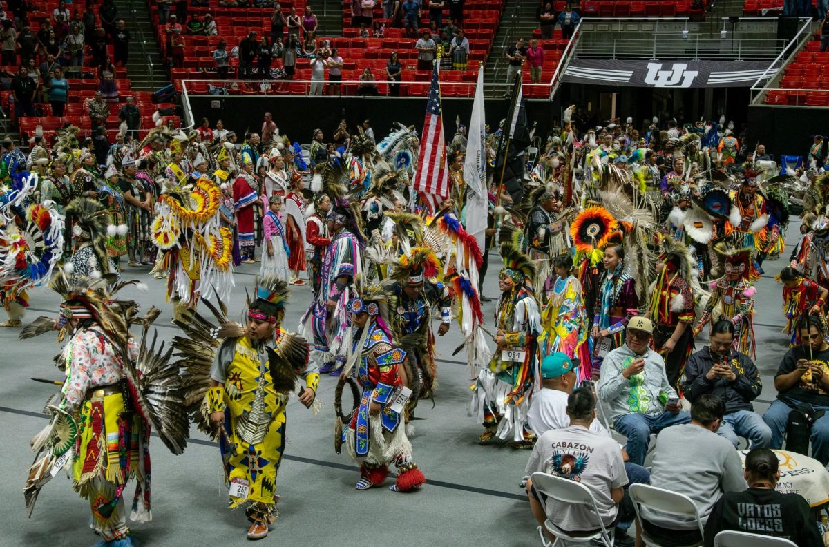 Dancers across all divisions in the final grand entry of this year's annual pow wow at the Jon M. Huntsman center on Saturday, March 21, 2026. (Photo by Leo LeBohec | The Daily Utah Chronicle)